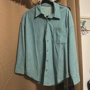 TEAL SHACKET. Suede like material.